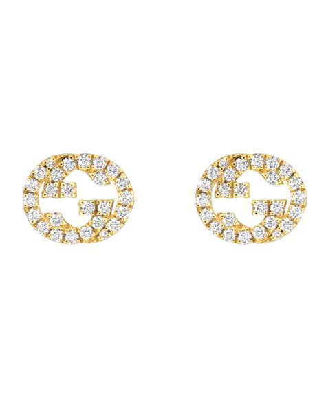 Cercei Gucci Interlocking G aur 18 kt stud cu diamante.